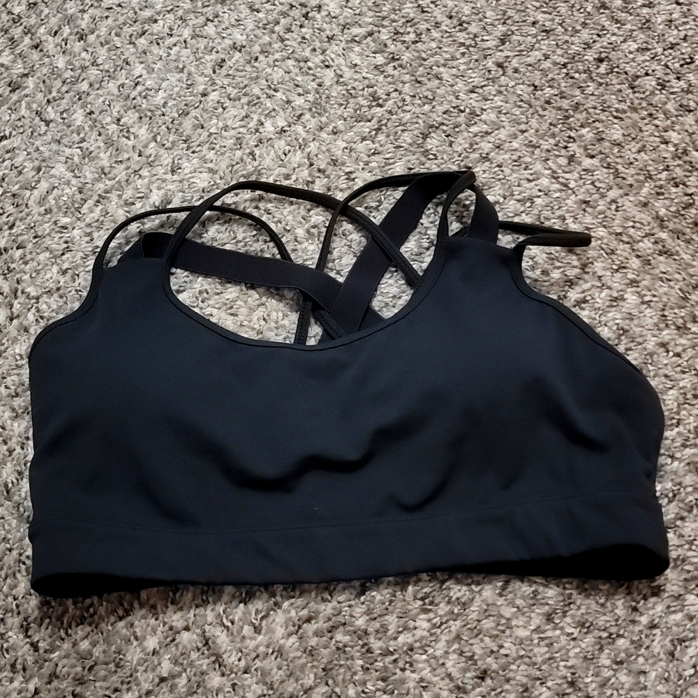 CNS over the head black sports bra.